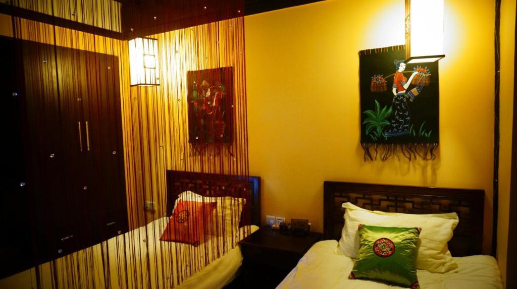 Lijiang Wangjia Courtyard Inn חדר תמונה