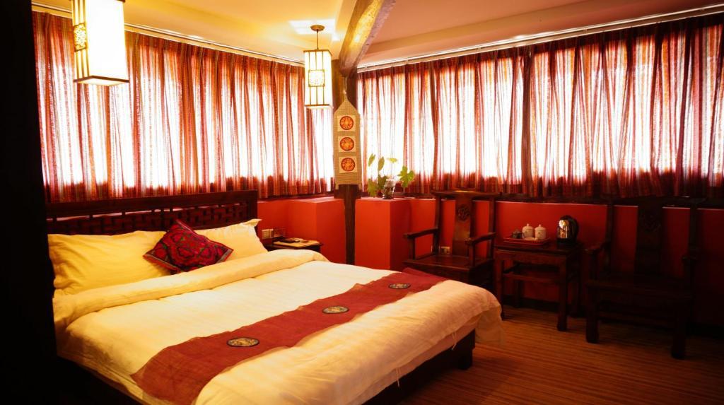 Lijiang Wangjia Courtyard Inn חדר תמונה